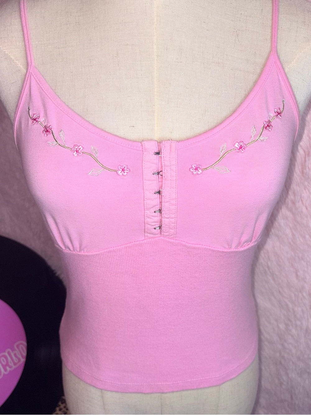 Pink corset style top with floral embroidery